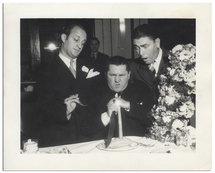 Moe Howard Personally Owned 10'' x 8'' Matte Publicity Photo From 1934 of Moe, Larry & Curly Practicing '''How to Carve a roll''' -- Very Good Plus Condition